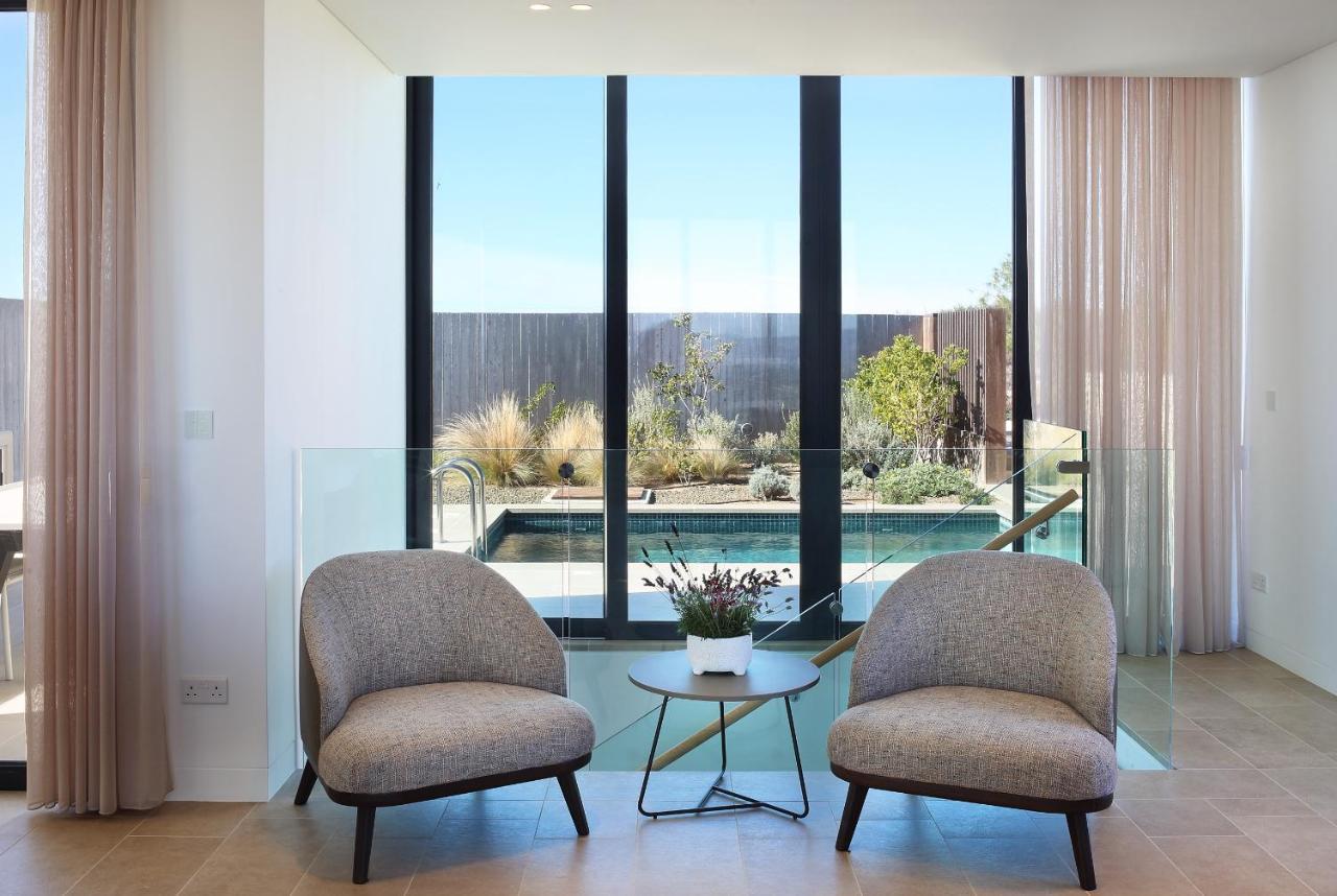 Minthis Resort Tsadha ภายนอก รูปภาพ The interior of a home in the suburb of Cheltenham, Victoria, Australia.