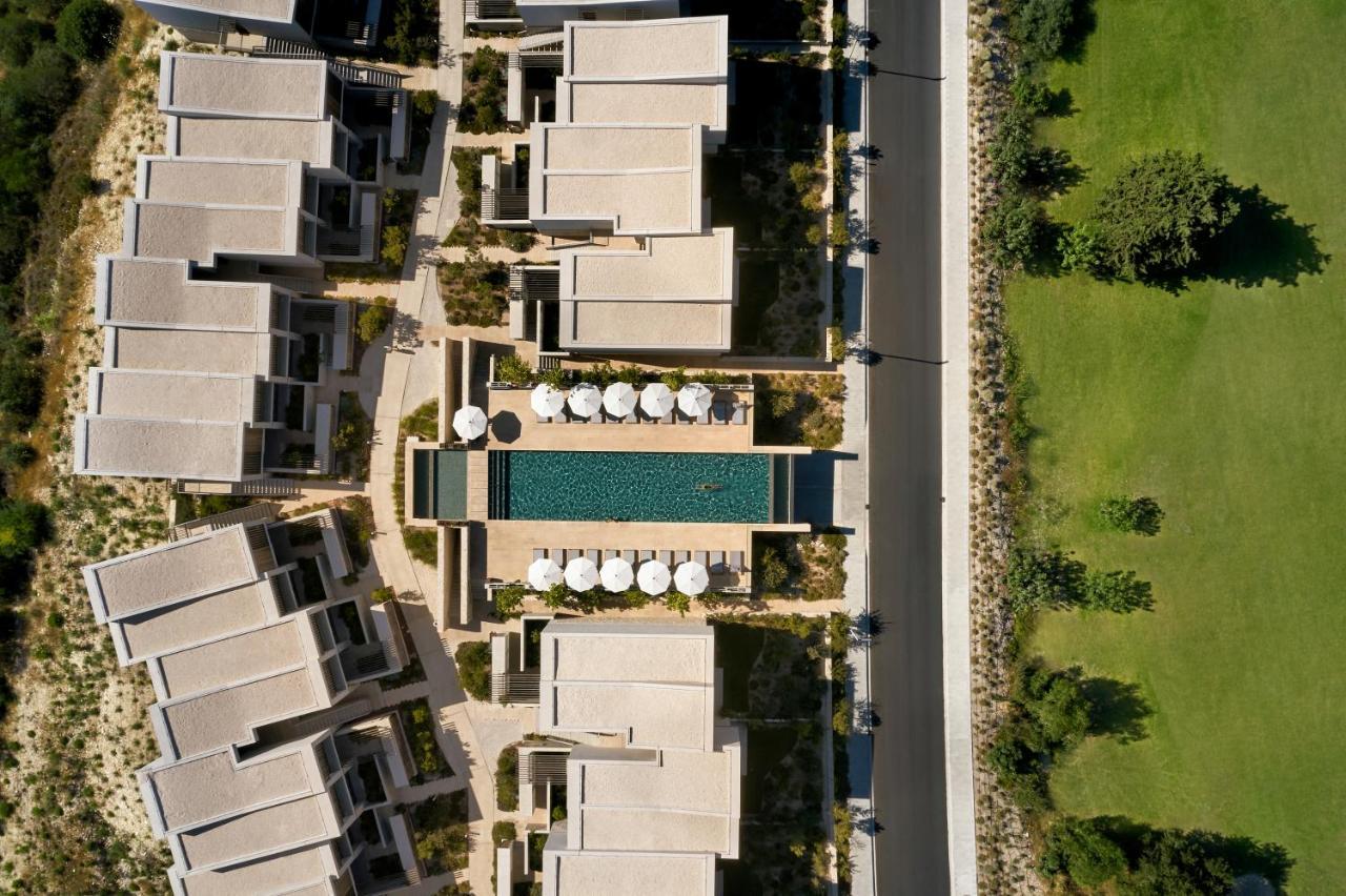 Minthis Resort Tsadha ภายนอก รูปภาพ Aerial view of the hotel